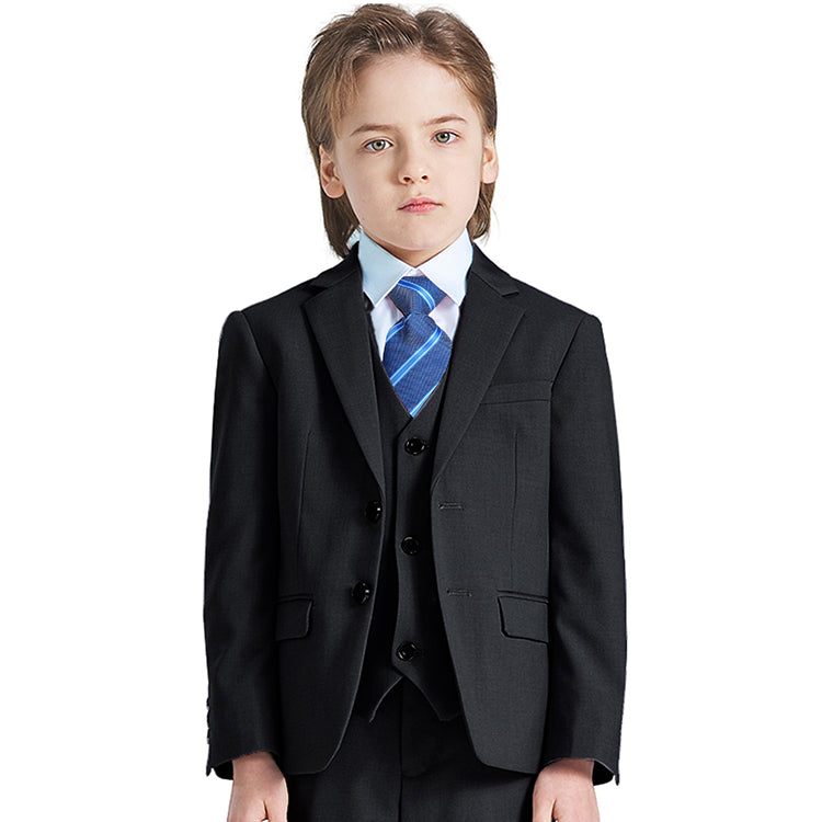 A boy wearing a black YND suit.